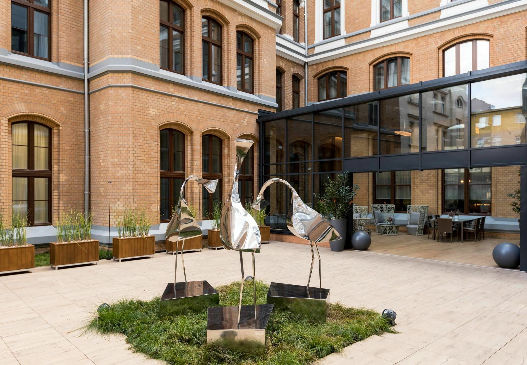 Ac Hotel By Marriott Breslavia Exterior foto The courtyard of the new building